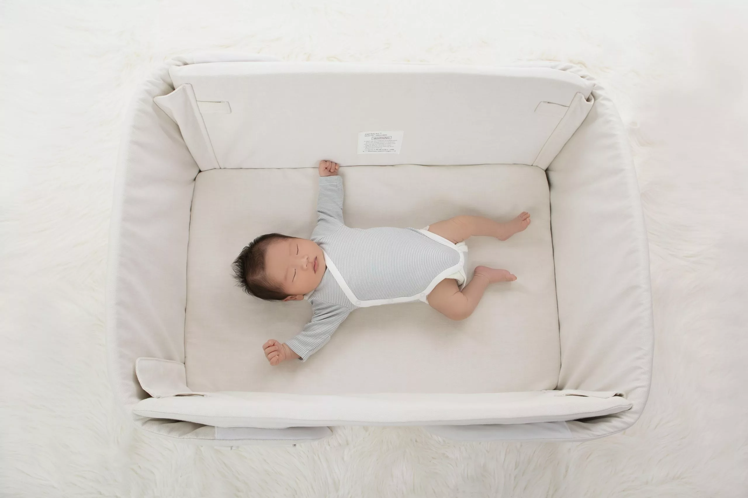baby sleeping in Angel baby box